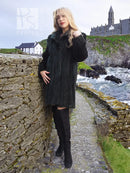 Dark sheared beaver jacket with stand collar, long sleeves and straight hem.
