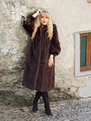 Dark brown mink fur coat with high collar and full-length button front, A-line fit