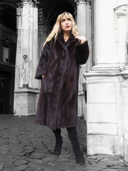 Dark mink fur coat with notched collar, button-front, three-quarter sleeves, knee length