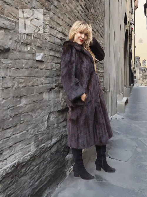 Dark mink fur coat with notched collar, long sleeves, button-front, knee length