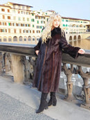 Long dark fur mink coat with black fox notch collar, buttoned front and wide sleeves