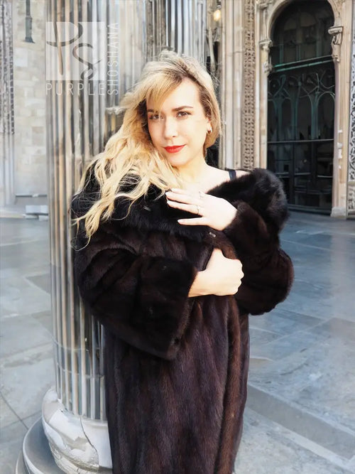 Black mink fur coat with fox notch collar, close-up of raised fur texture