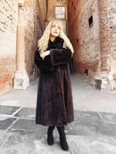 Black mink fur coat with black fox notch collar, belted long length and wide cuffs