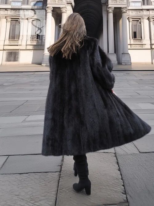 Black mink fur coat viewed from back, full skirt shape, long sleeves