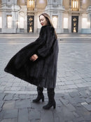 Black mink fur coat, A-line silhouette with wide sleeves and side profile