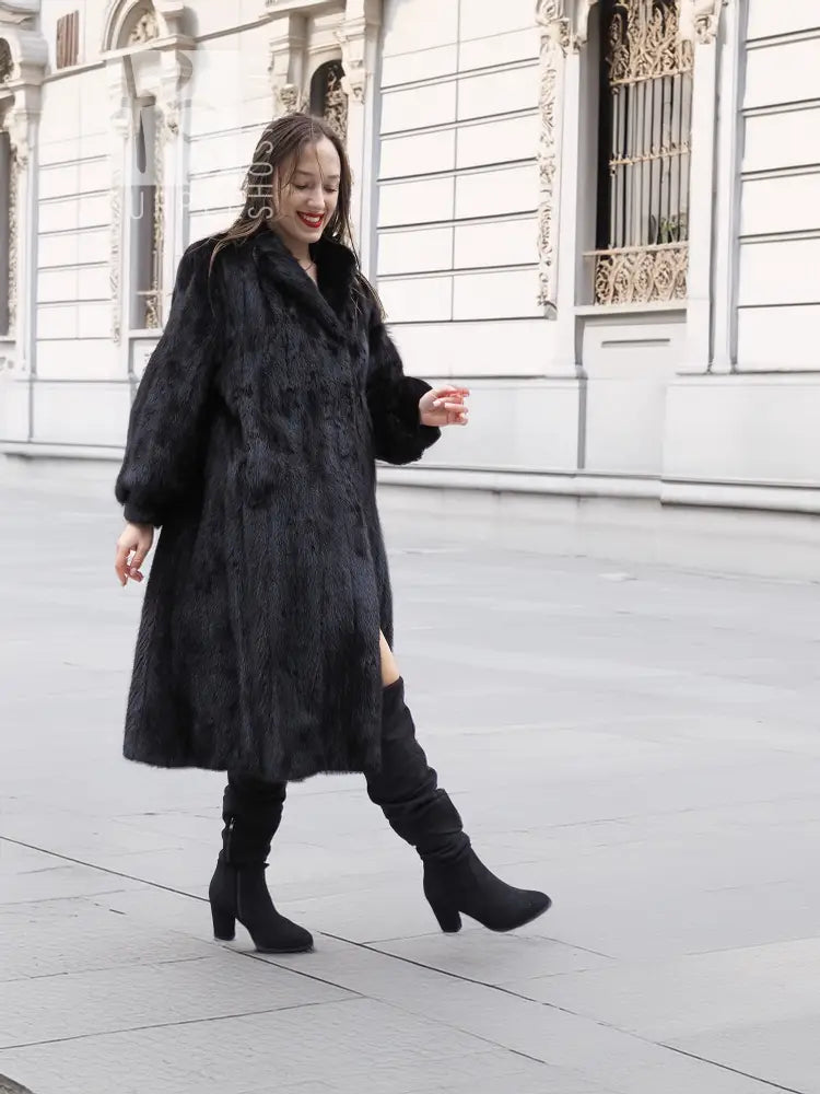 Black mink fur coat, mid-length with buttonless front and long sleeves