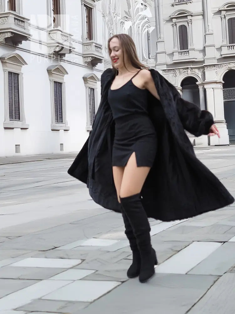 Black mink fur coat with wide open front, long sleeves, knee-length hem