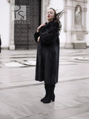 Black mink fur coat with hooded collar and long sleeves, full-length hem