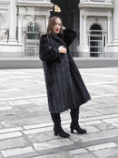 Black mink fur coat with thick fur texture, long sleeves, open front detail