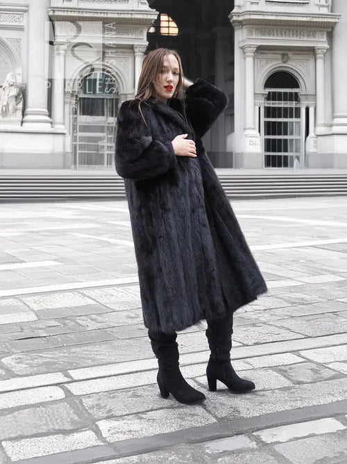 Black mink fur coat with thick fur texture, long sleeves, open front detail