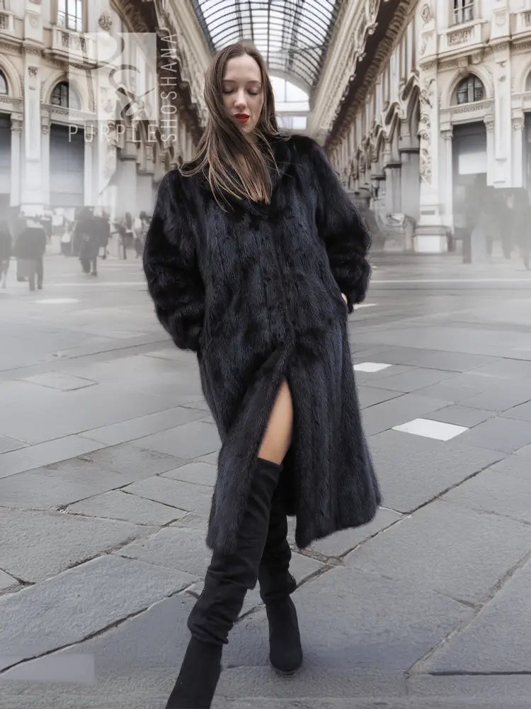 Black mink fur coat with long sleeves, open front, thigh slit detail