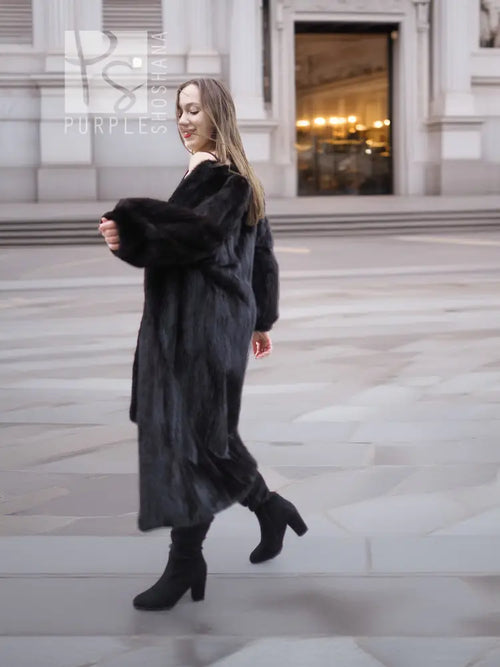 Black mink fur coat, long with full-length sleeves and wide cuffs