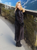Black mink fur coat with hood, side view showing long straight silhouette.