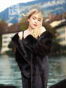 Black mink fur coat close-up of shoulders and collar, long sleeves with cuff detail