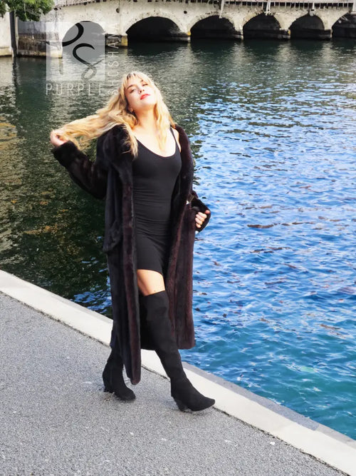 Black mink fur coat with wide collar and long sleeves, open front styling