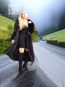 Black mink fur coat with fur-lined hood and flowing mid-calf length