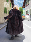 Black mink fur coat with hood, back view showing full length and drape.