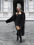 Black mink fur coat jacket with shawl collar and long sleeves, front left view.