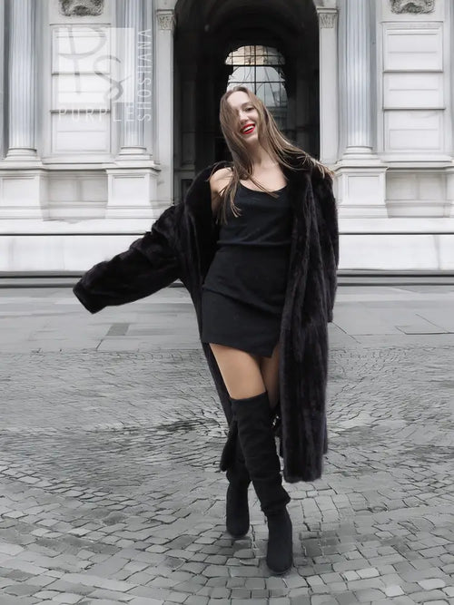 Black mink fur coat jacket with shawl collar and long sleeves, front left view.