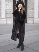 Black mink fur coat with front slit and matching black fur hat, knee length
