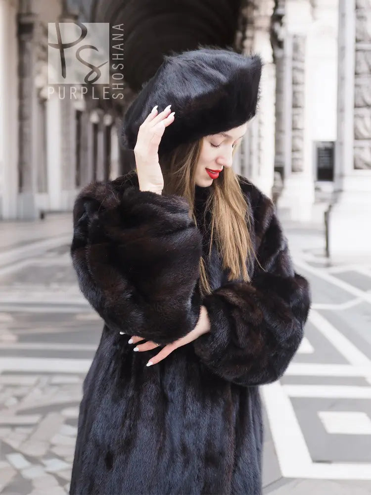 Black mink fur coat with oversized collar and matching fur hat