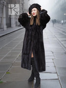 Black mink fur coat with full sleeves and large collar, paired with a matching mink hat