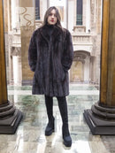 Black mink fur jacket with long sleeves, mid-thigh length, front view.