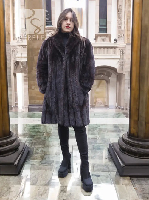 Black mink fur jacket with long sleeves, mid-thigh length, front view.