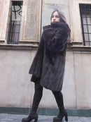 Dark mink fur coat with high collar, long sleeves, open front, mid-length hem