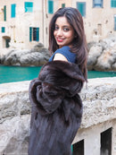 Dark mink fur jacket with large collar, shoulder-to-arm coverage, and close-up angle