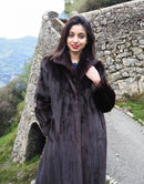 Dark mink fur coat with notched collar and roomy sleeves, front view