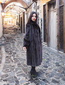 Dark mink fur long coat with notched collar, side view, and full-length sleeves