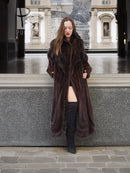 Dark brown mink fur coat with hood, open front and long sleeves over boots