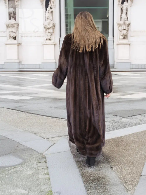 Long dark brown mink fur coat with hood, back view and straight hem