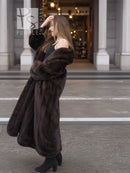 Dark brown mink fur coat with wide shawl collar, open front, full length