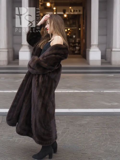 Dark brown mink fur coat with wide shawl collar, open front, full length