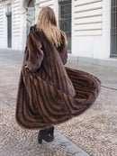 Dark brown mink fur coat from behind with hood and oversized fur collar