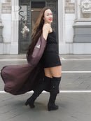 Dark brown mink fur coat with hood, long flared silhouette and side drape