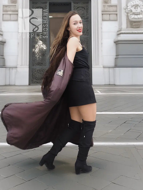 Dark brown mink fur coat with hood, long flared silhouette and side drape