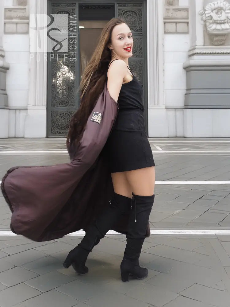 Dark brown mink fur coat with hood, long flared silhouette and side drape