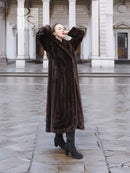 Long dark brown mink fur coat with wide collar and full sleeves, front view