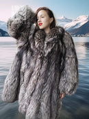Silver fox fur coat in dark silver-gray, textured full front, oversized fur shoulders.