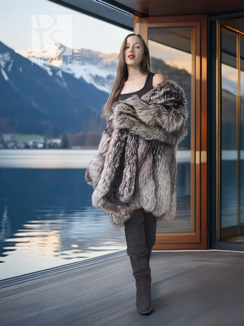 Silver fox fur coat in dark silver-gray, open front with voluminous fur sleeves.