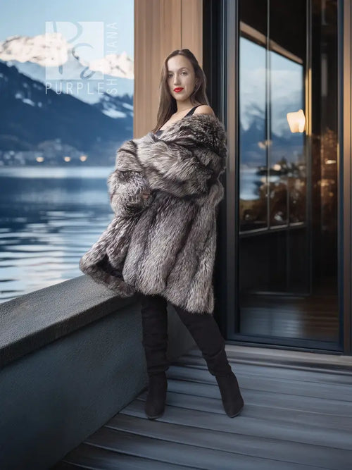 Silver fox fur coat in dark silver-gray, wide collar, open front, long sleeves.