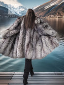Silver fox fur coat shown from side, thick fur texture and wide collar.