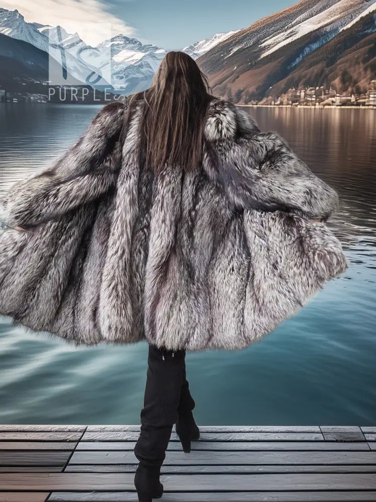 Silver fox fur coat shown from side, thick fur texture and wide collar.