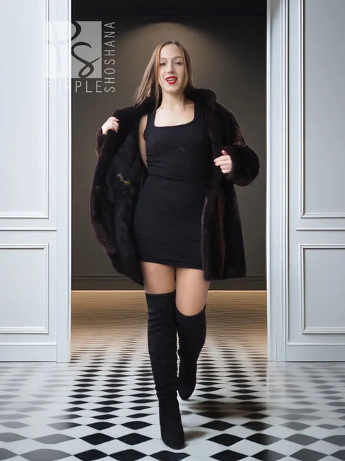 Women's two-tone mink jacket with open front, dark fur and tan herringbone paneling.