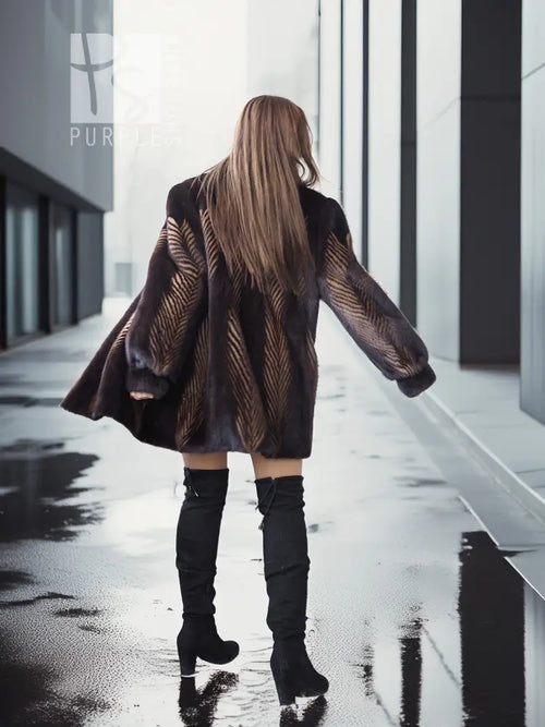 Two-tone mink jacket with herringbone texture, rear view with short hem