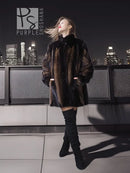 Two-tone mink jacket with herringbone design and dark collar, front view, long sleeves.