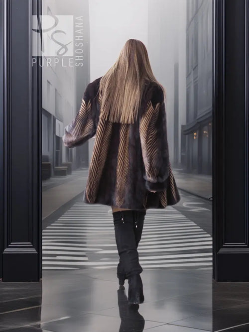 Two-tone mink jacket with herringbone pattern, rear view with flared sleeves